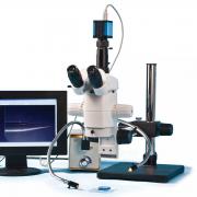 Precision stereo zoom trinocular microscope (IV)on boom stand, camera, light